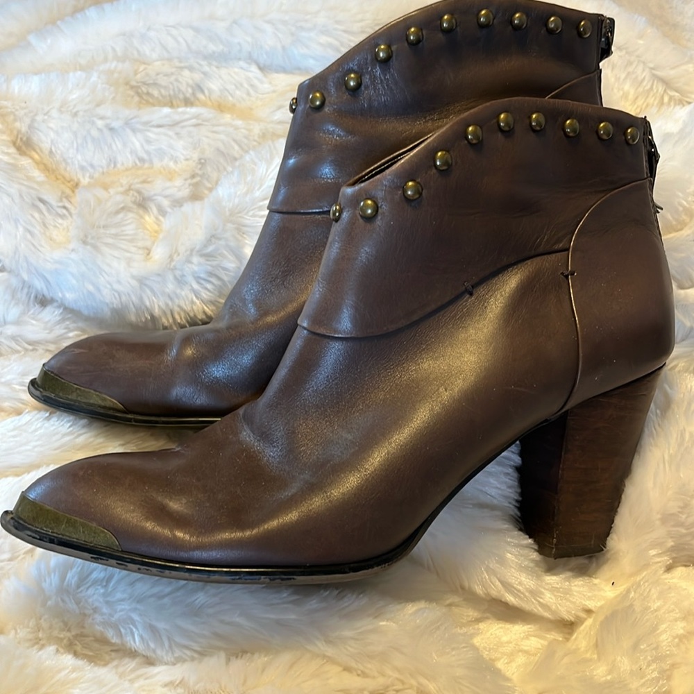 Brown leather ankle bootie.